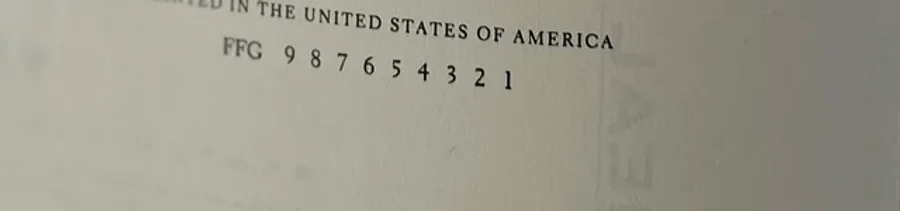 A printing line reading 9 8 7 6 5 4 3 2 1 on a copyright page. Because it still includes the 1, this is a first printing.